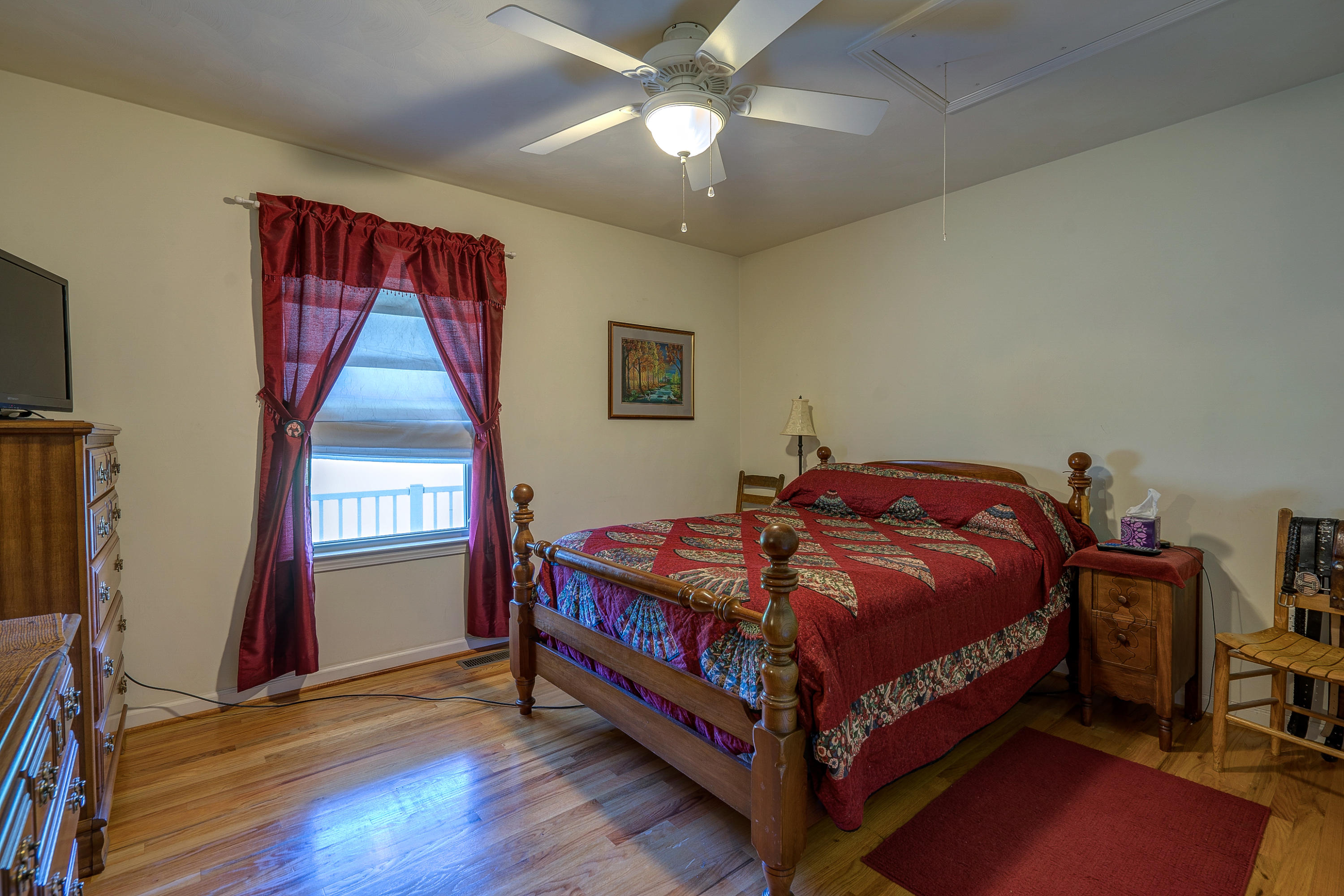 3007 Sandy Level Road Goodview, VA 24095 - Photo 41 of 51 a bed sitting in a bedroom next to a window