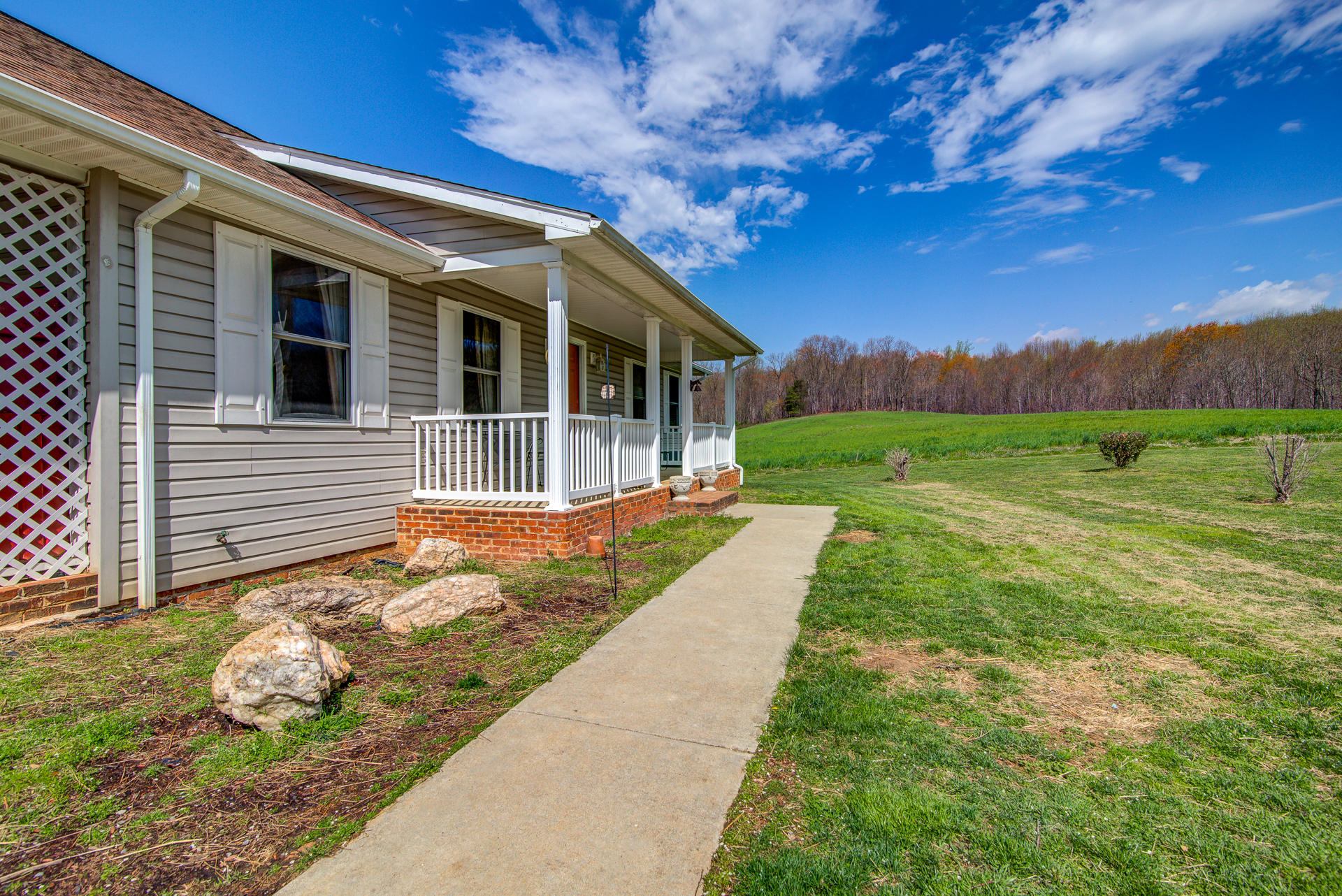 3007 Sandy Level Road Goodview, VA 24095 - Photo 9 of 51 a view of a house with a backyard