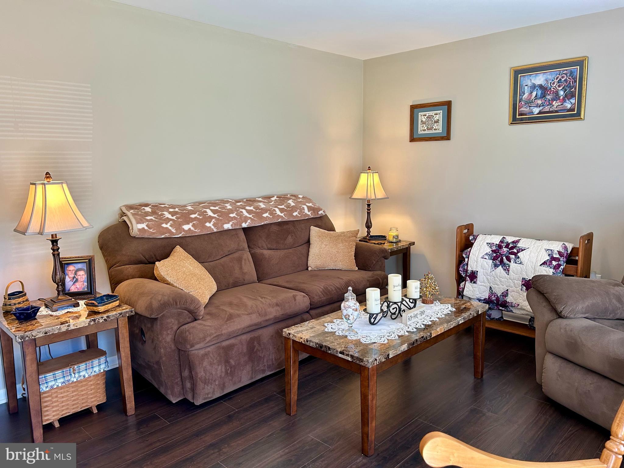 259 Hoffman Road Gettysburg, PA 17325 - Photo 7 of 23 a living room with furniture and a wooden floor