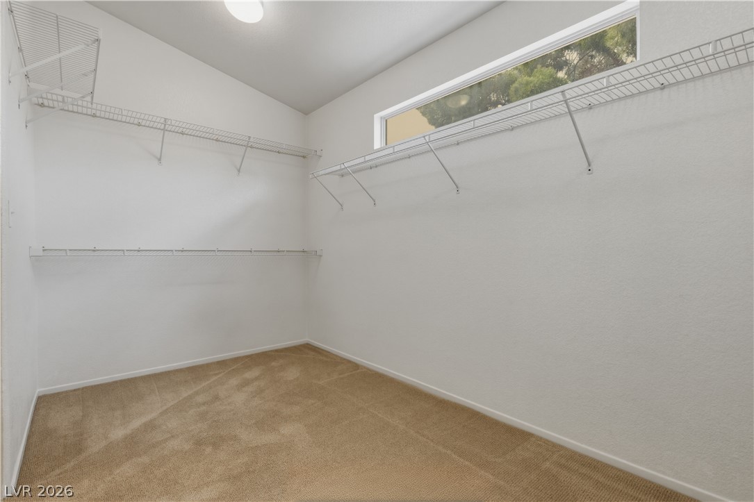 29 Olive Tree Henderson, NV 89074 - Photo 36 of 60 This spacious walk-in closet features ample storage and natural light.