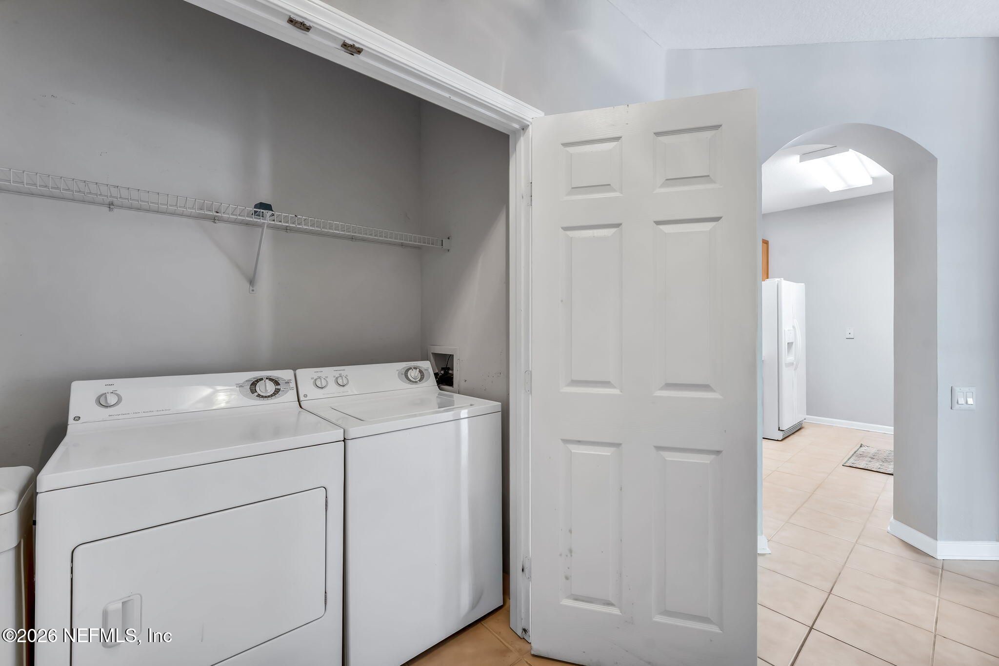 7990 Baymeadows Road East, Unit 520 Jacksonville, FL 32256 - Photo 5 of 41 a utility room with dryer and washer
