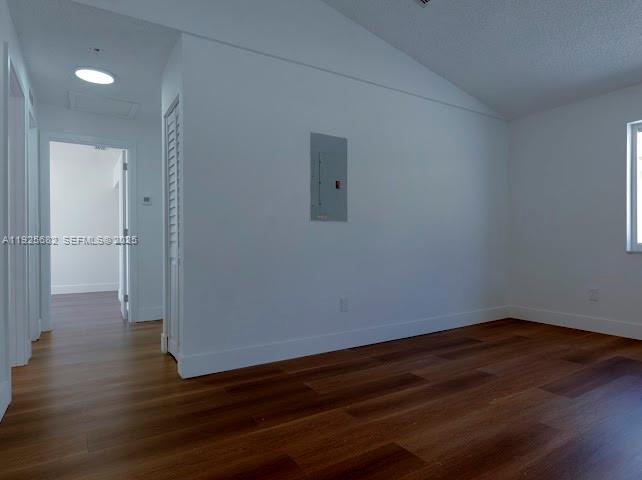 11475 Southwest 181st Street, Unit A Miami, FL 33157 - Photo 15 of 18 a view of a room with wooden floor and white walls