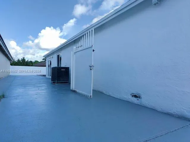 a view of livingroom with kitchen