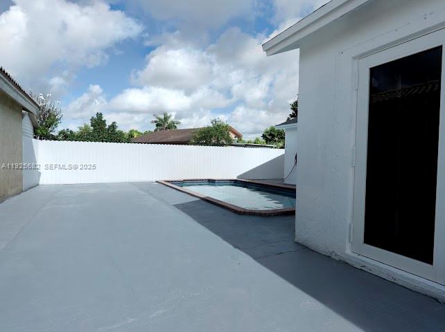 11475 Southwest 181st Street, Unit A Miami, FL 33157 - Photo 17 of 18 a view of a terrace