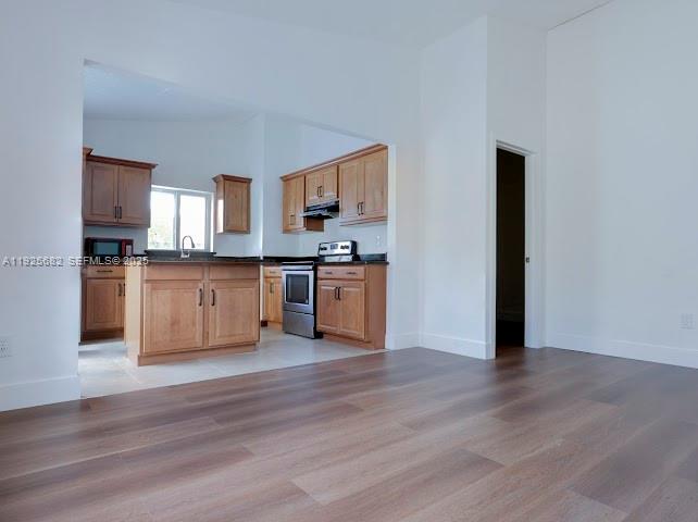 11475 Southwest 181st Street, Unit A Miami, FL 33157 - Photo 8 of 18 a view of kitchen with wooden floor