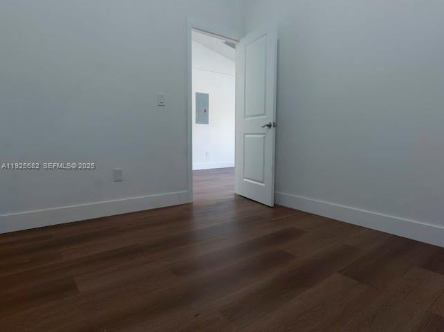 11475 Southwest 181st Street, Unit A Miami, FL 33157 - Photo 9 of 18 an empty room with wooden floor and windows