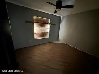 an empty room with a empty space and window