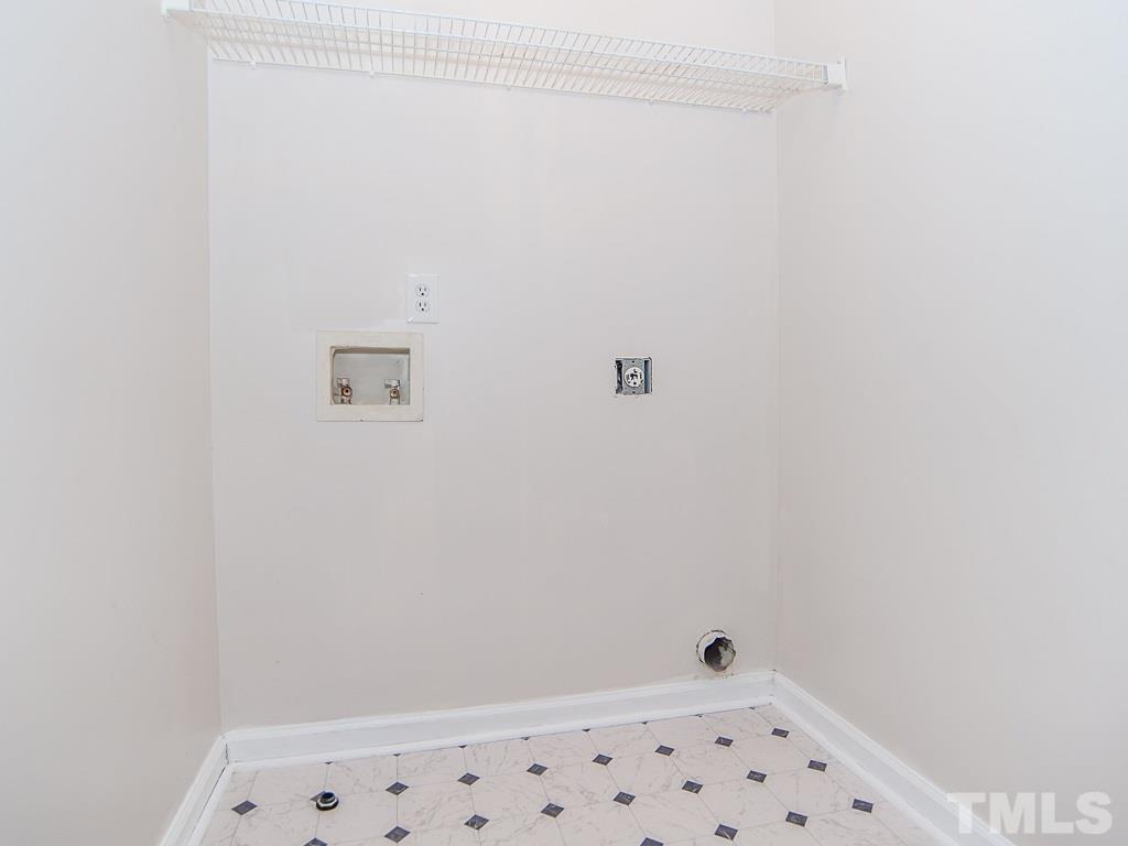 3824 Pin Oak Road Raleigh, NC 27604 - Photo 14 of 27 a bathroom with a shower and a sink