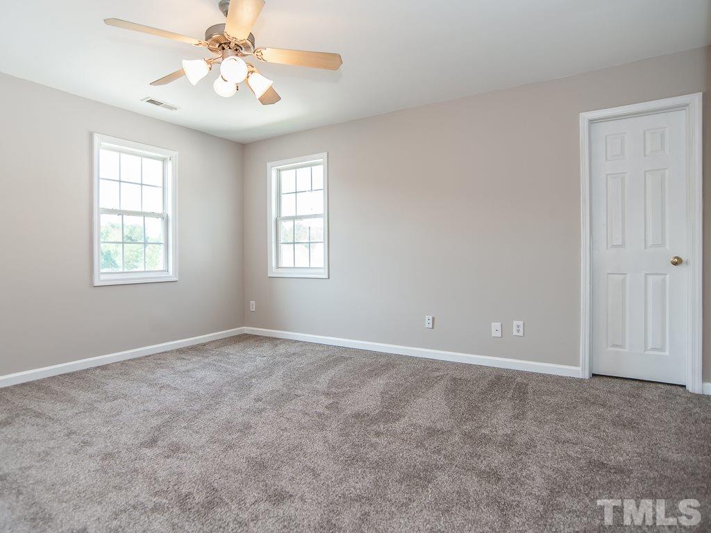3824 Pin Oak Road Raleigh, NC 27604 - Photo 15 of 27 a view of an empty room with a window