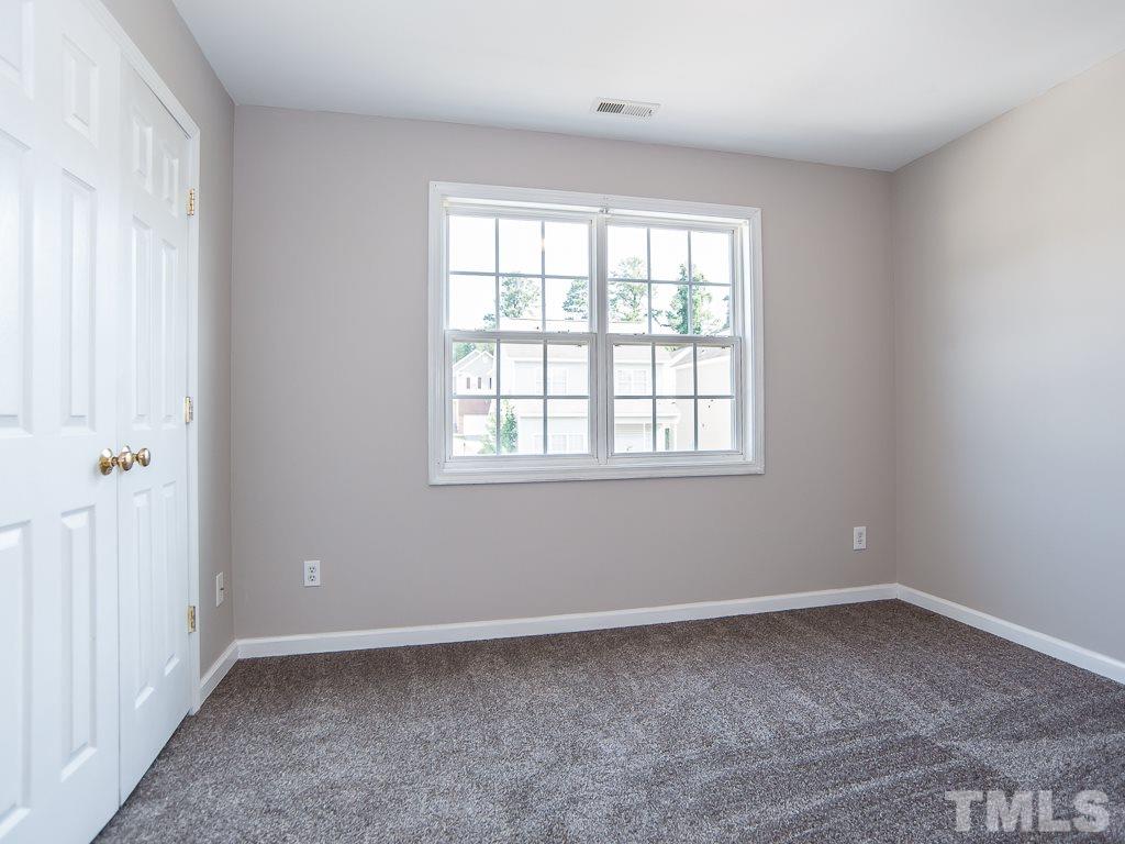 3824 Pin Oak Road Raleigh, NC 27604 - Photo 21 of 27 an empty room with a window