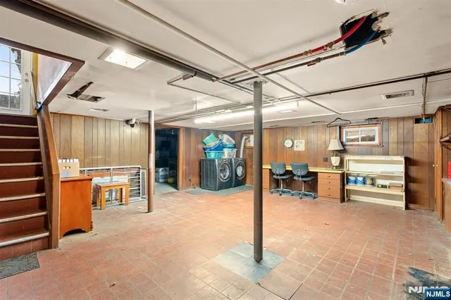 a view of a livingroom with table and chair