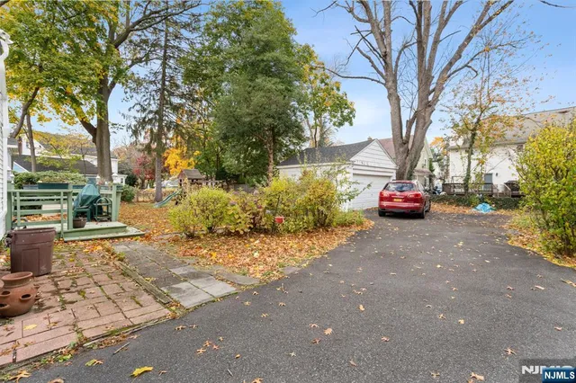 a view of a street with cars