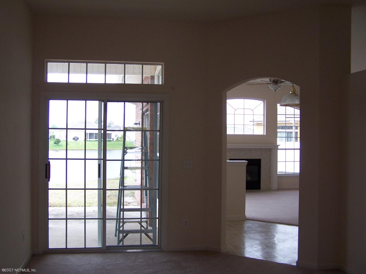 1962 Nottingham Road Jacksonville, FL 32246 - Photo 4 of 24 Living room to patio