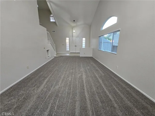 a view of hallway with livingroom