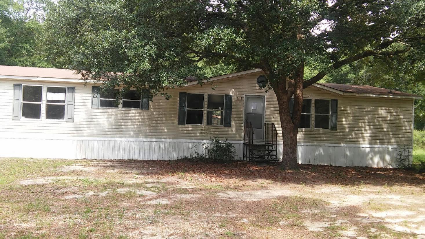4353 Richardson Road Crestview, FL 32539 - Photo 1 of 15 a view of a house with a yard