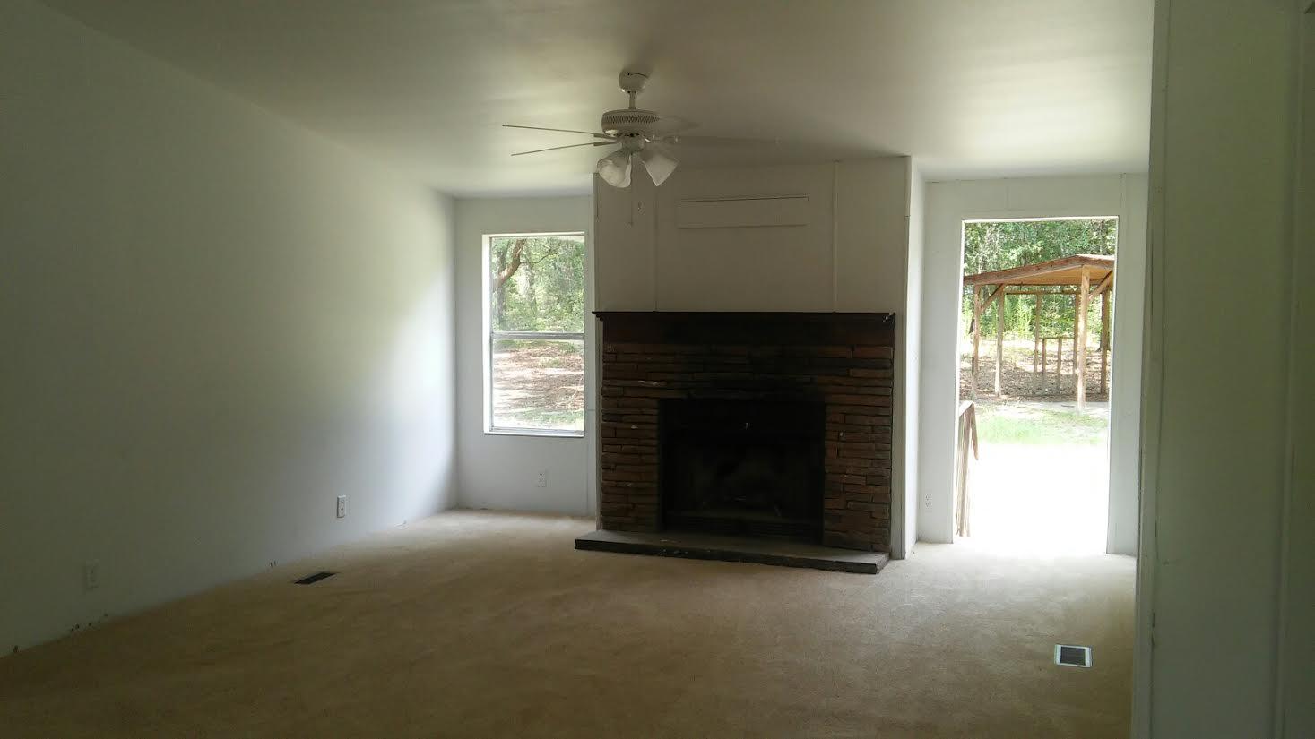 4353 Richardson Road Crestview, FL 32539 - Photo 2 of 15 a living room with a fireplace