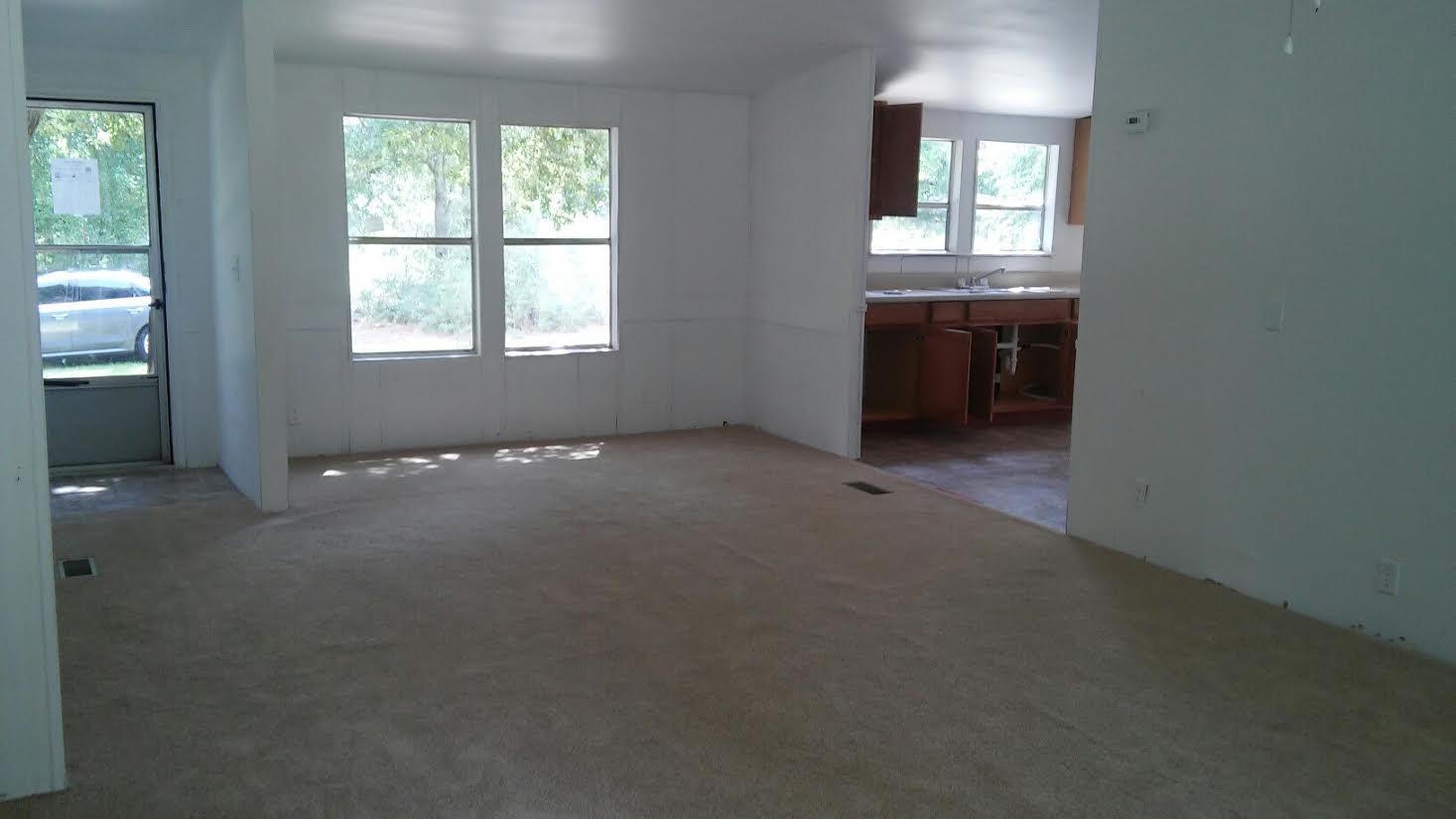 4353 Richardson Road Crestview, FL 32539 - Photo 3 of 15 an empty room with windows