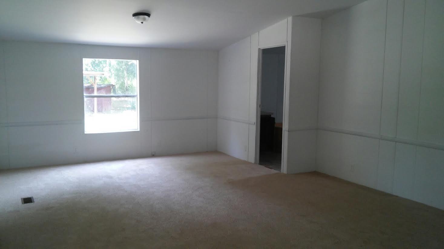 4353 Richardson Road Crestview, FL 32539 - Photo 4 of 15 an empty room with windows