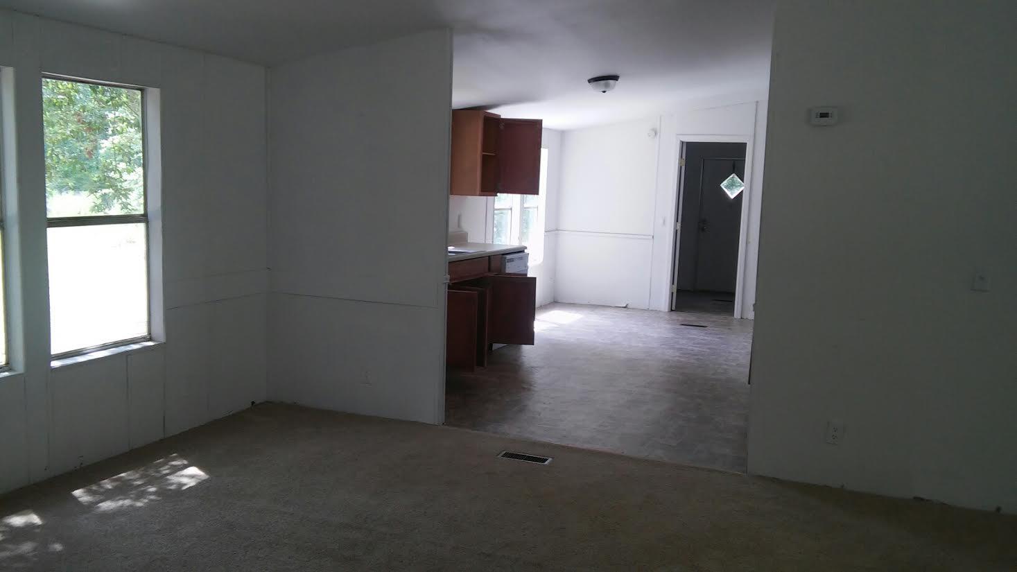 4353 Richardson Road Crestview, FL 32539 - Photo 7 of 15 an empty room with windows and closet