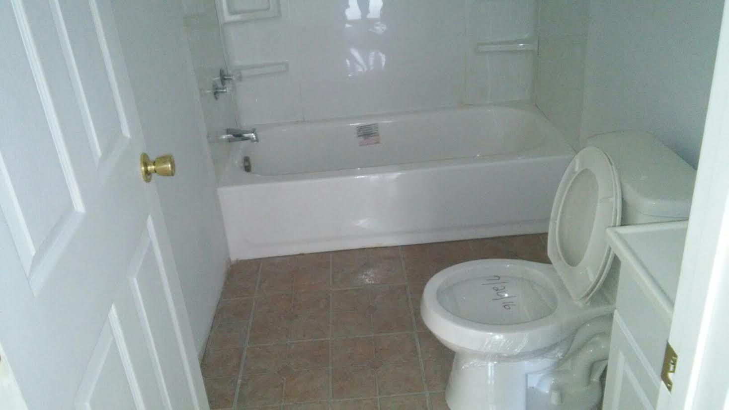 4353 Richardson Road Crestview, FL 32539 - Photo 10 of 15 a bathroom with a sink and toilet