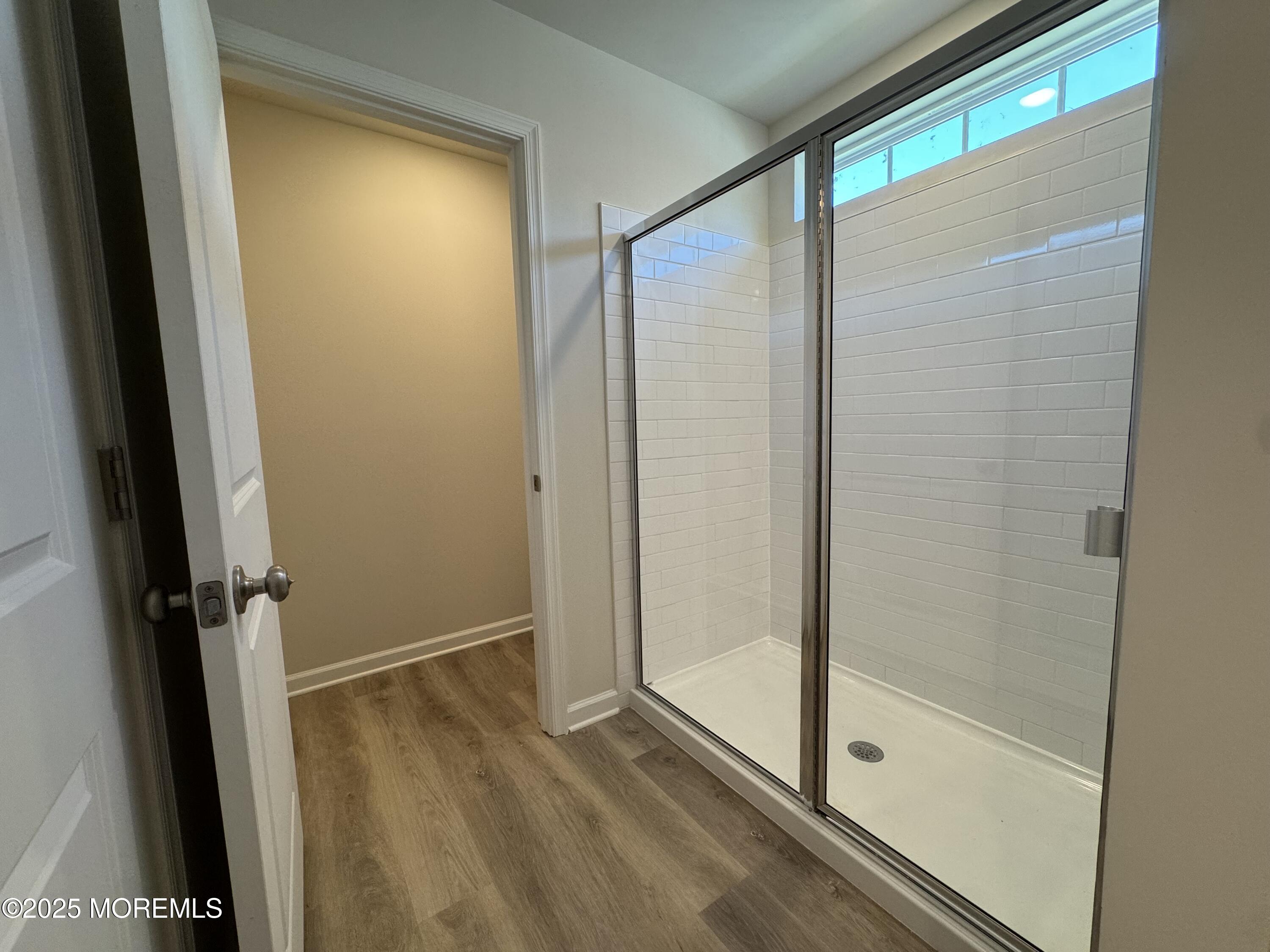 17 Whaler Avenue Barnegat, NJ 08005 - Photo 16 of 21 a bathroom with a glass shower door