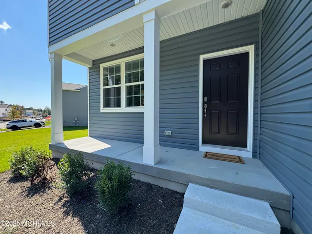 a view of a backyard of a house