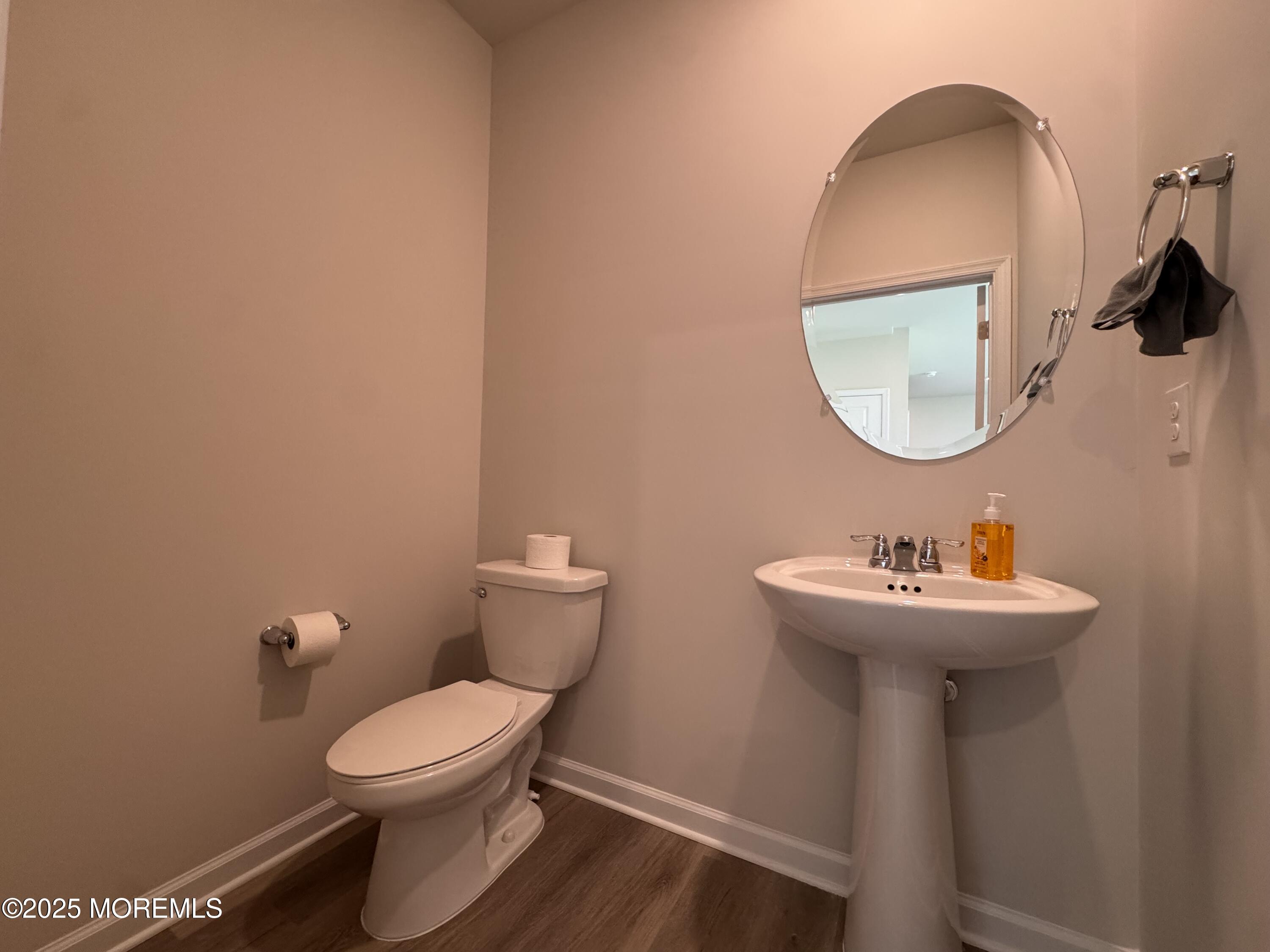17 Whaler Avenue Barnegat, NJ 08005 - Photo 7 of 21 a bathroom with a toilet sink and mirror