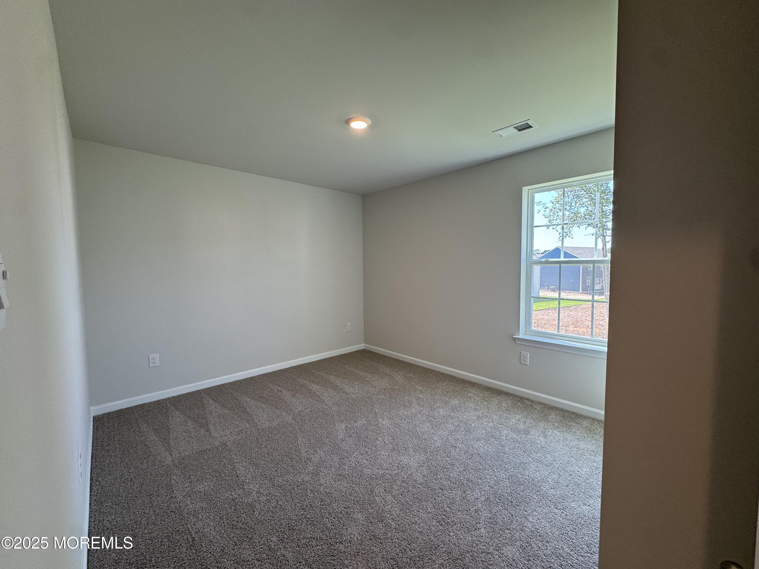 17 Whaler Avenue Barnegat, NJ 08005 - Photo 9 of 21 an empty room with a window