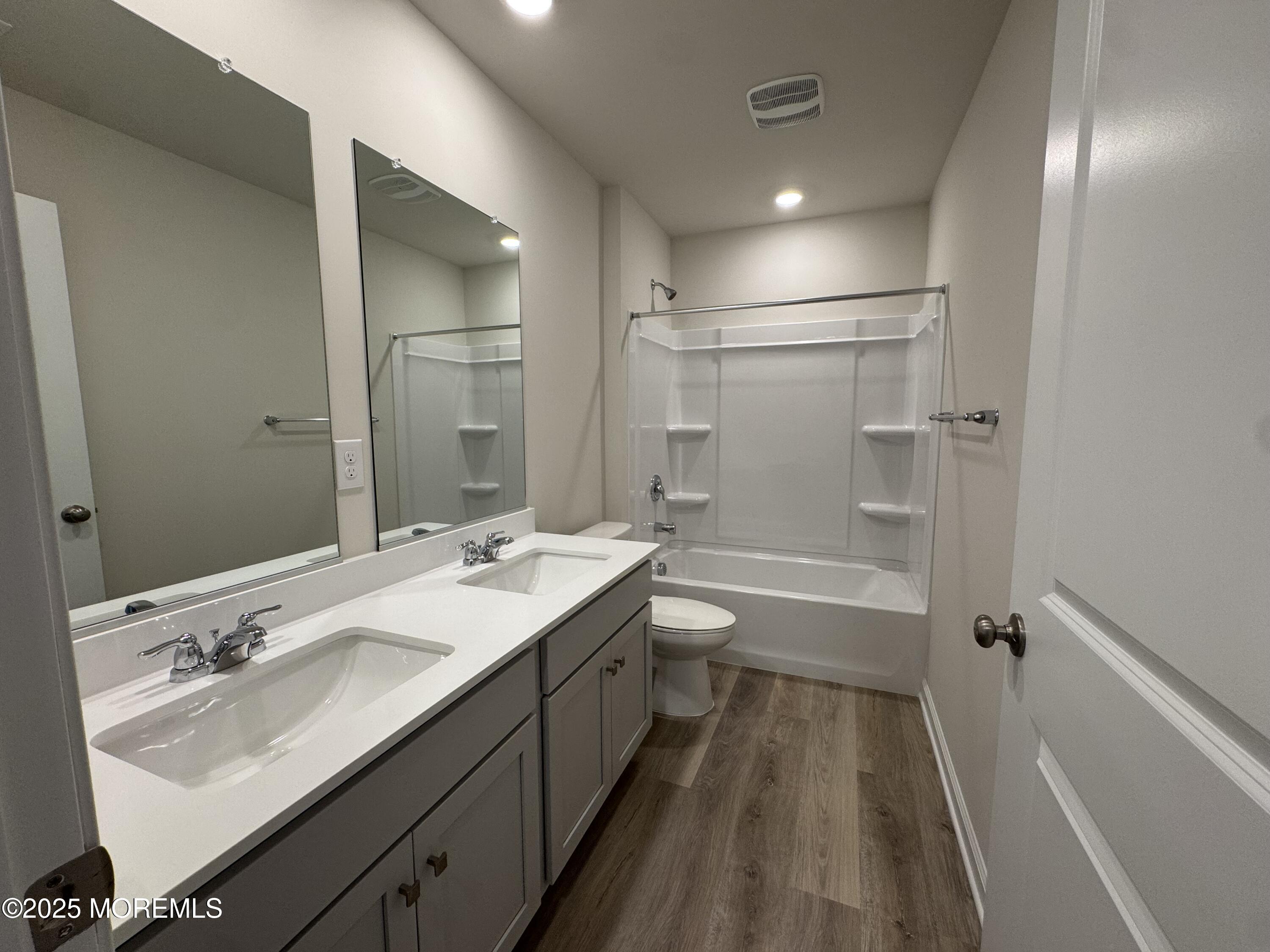 17 Whaler Avenue Barnegat, NJ 08005 - Photo 10 of 21 a bathroom with a double vanity sink mirror double shower and a bathtub