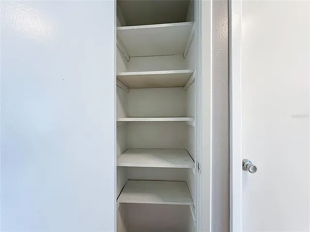 a utility room with a toilet