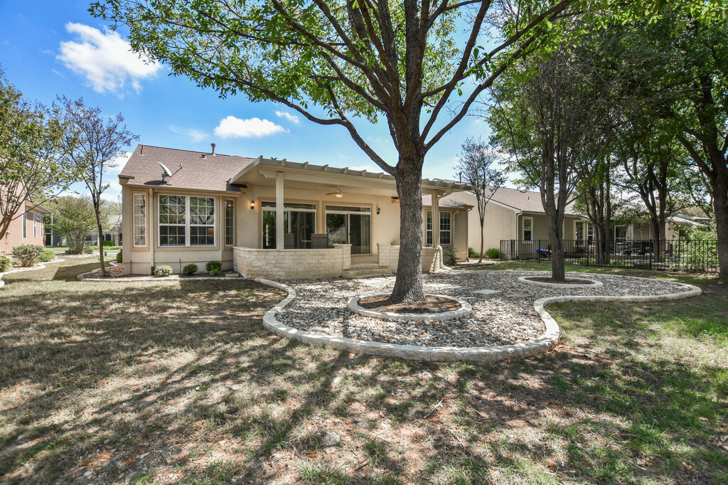 735 Breezeway Lane Georgetown, TX 78633 - Photo 30 of 33 Back of property featuring a patio area and stucco siding