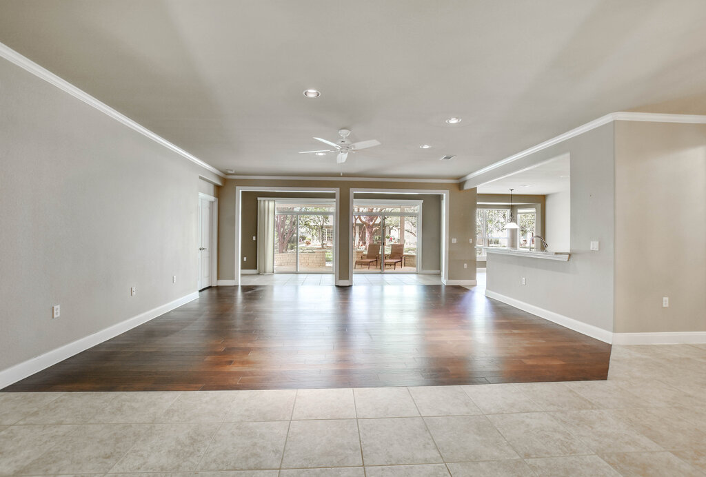 735 Breezeway Lane Georgetown, TX 78633 - Photo 4 of 33 Open living room with crown molding, ceiling fan and engineered hardwood flooring