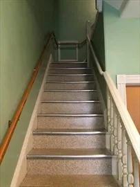 a utility room with a stove a washer and dryer