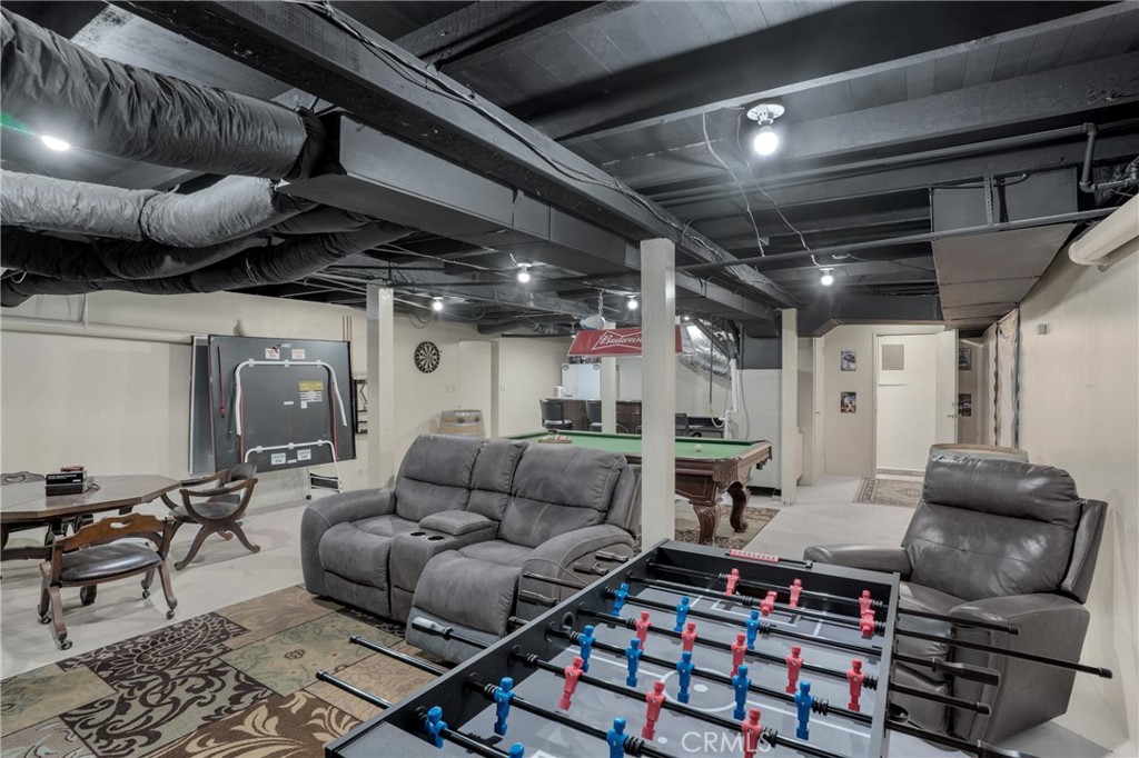 41257 Crest Drive Hemet, CA 92544 - Photo 18 of 53 this room has a lot of possibilities but currently used as a game room. Additional entry from outside.