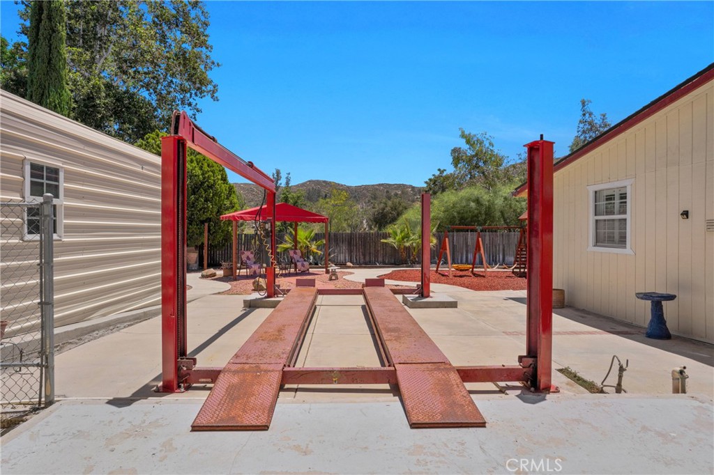41257 Crest Drive Hemet, CA 92544 - Photo 39 of 53 13,000 pound car lift.