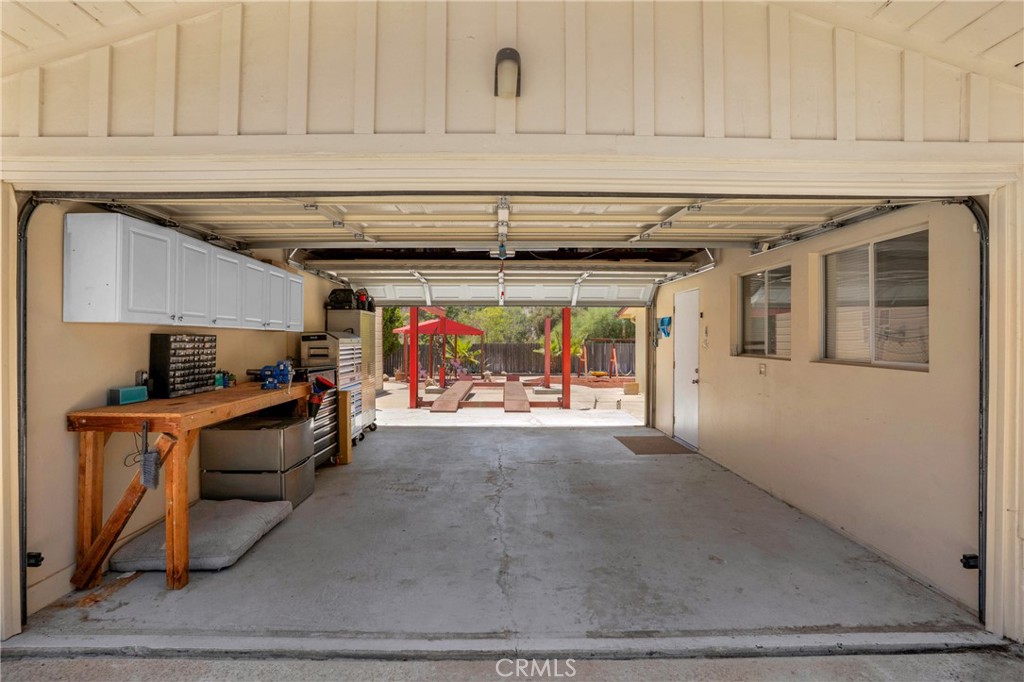 41257 Crest Drive Hemet, CA 92544 - Photo 43 of 53 2 car attached with pull through garage and 13,000 pound car lift.