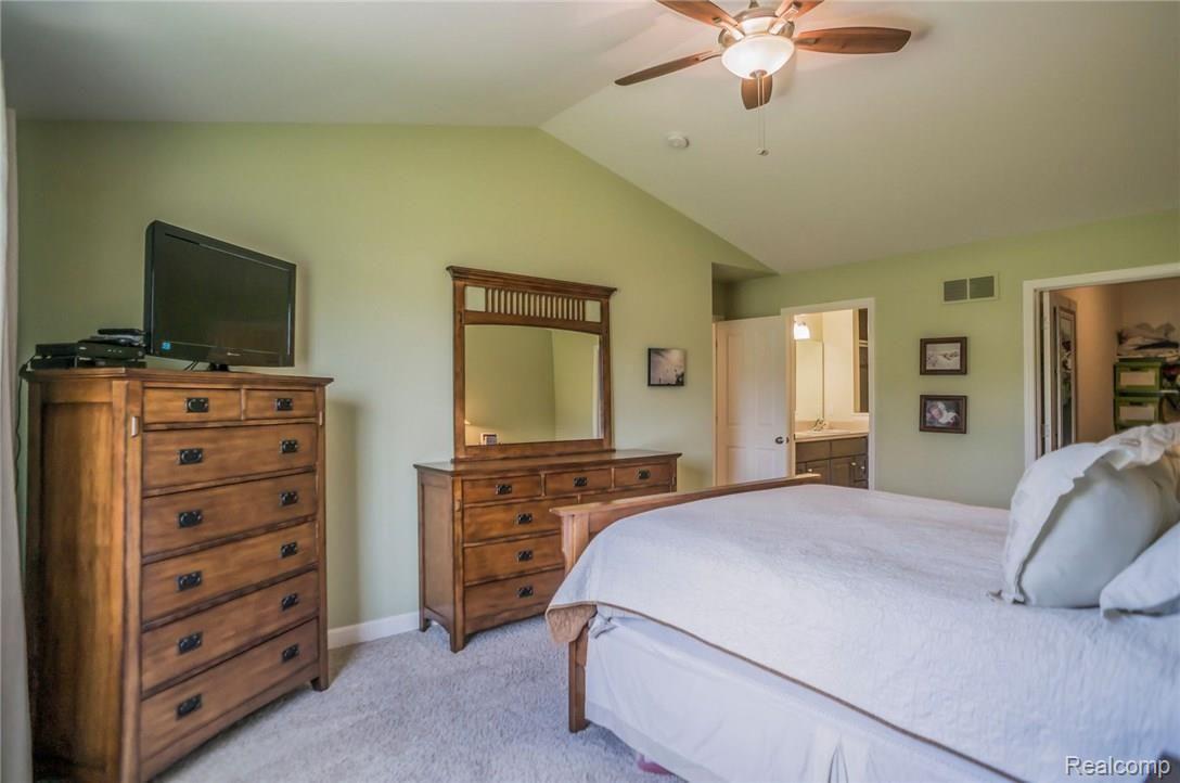 1193 Riverside Street Milford, MI 48381 - Photo 29 of 62 Master bedroom looking into bath and walk-in closet.