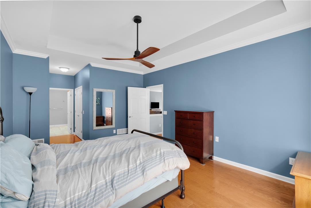 1011 Resolution Drive Bethlehem, PA 18017 - Photo 23 of 49 a bedroom with a bed and a dresser