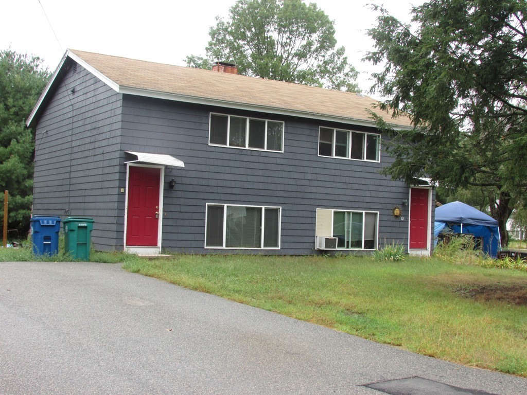 12 Chatham Road Billerica, MA 01821 - Photo 1 of 16 a house that has a big yard and a large tree