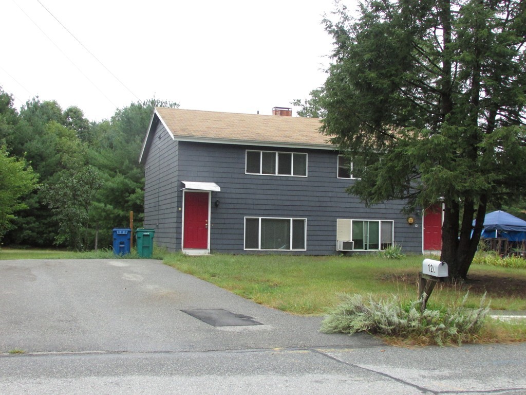 12 Chatham Road Billerica, MA 01821 - Photo 16 of 16 a front view of a house with a yard