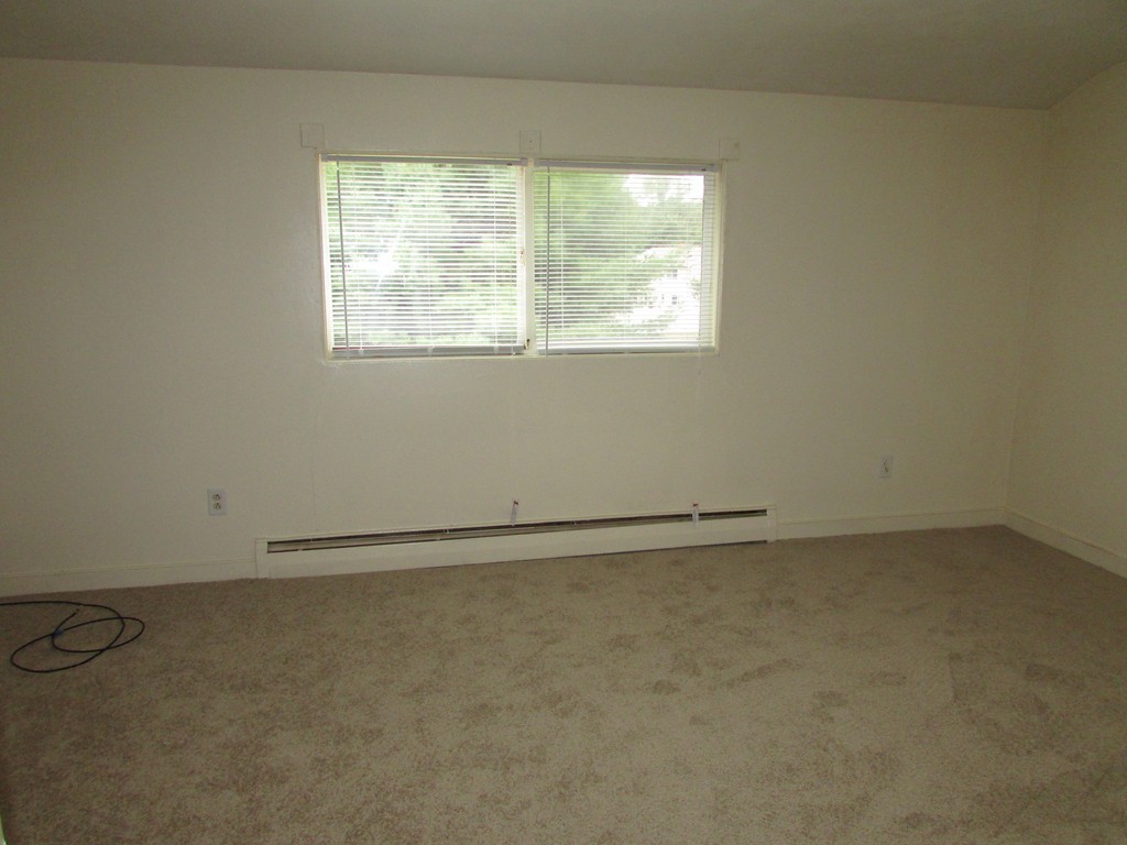 12 Chatham Road Billerica, MA 01821 - Photo 7 of 16 an empty room with a window