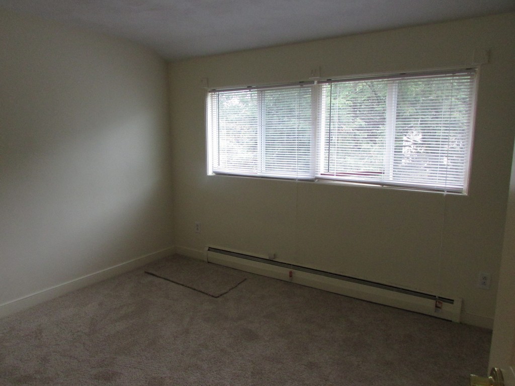 12 Chatham Road Billerica, MA 01821 - Photo 9 of 16 an empty room with a window
