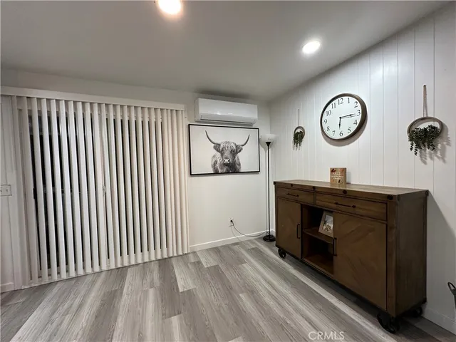 a bedroom with a bed and furniture