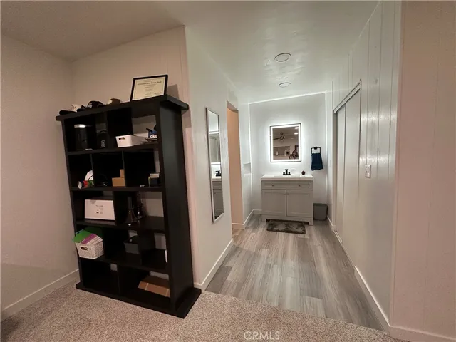 a view of room with furniture and windows