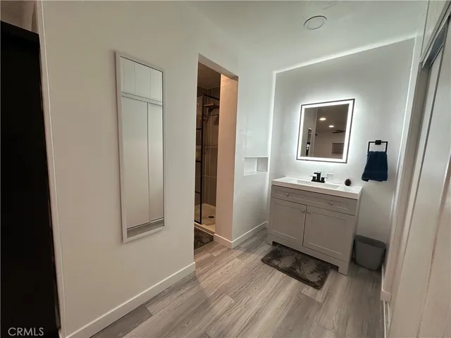 a view of a living room and floor to ceiling window