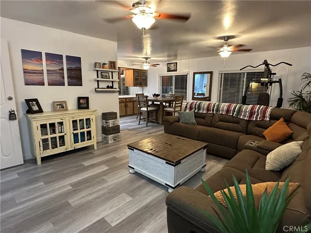 a view of a livingroom with furniture and window