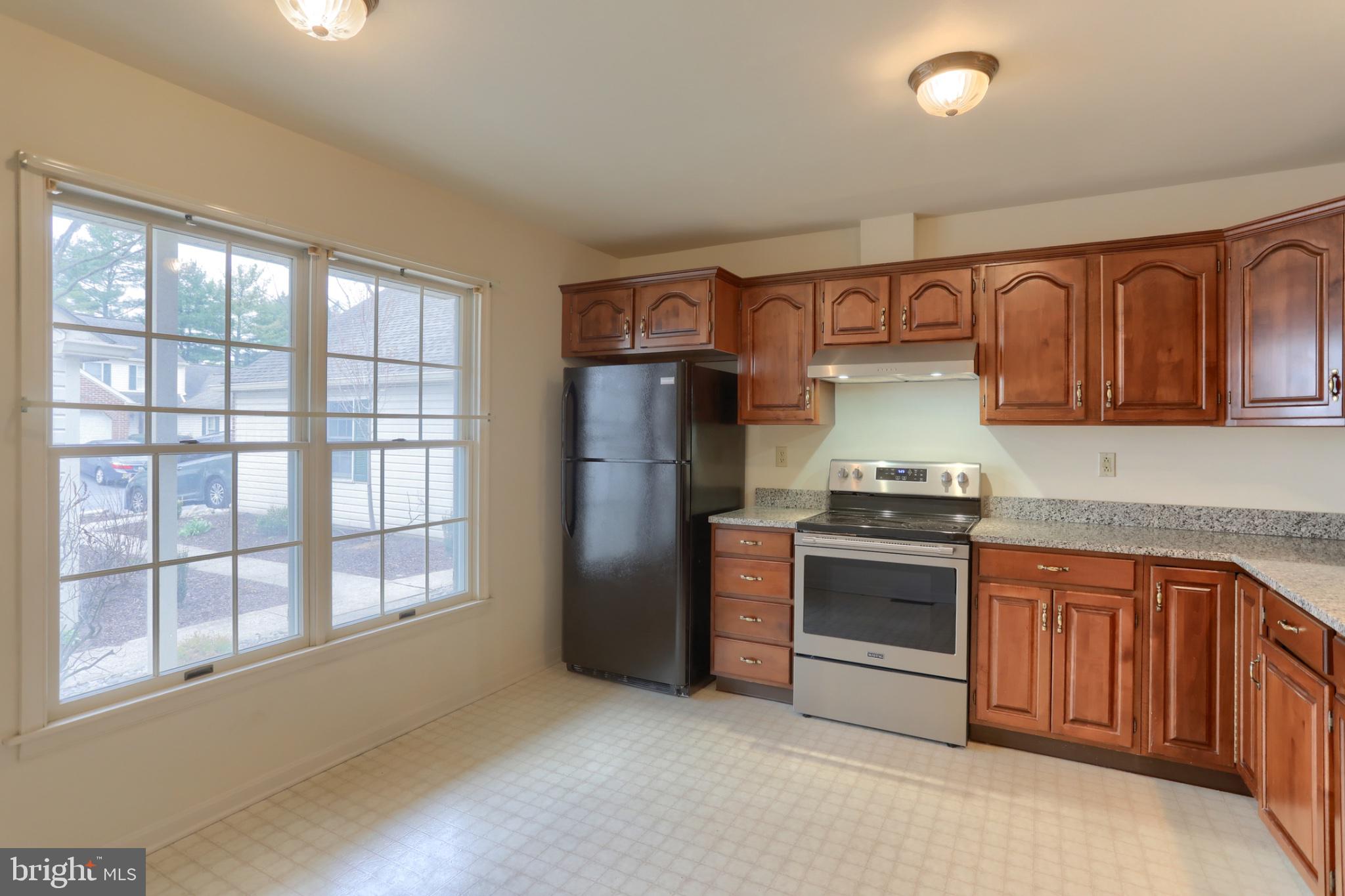 2057 East Raleigh Road Hummelstown, PA 17036 - Photo 10 of 39 Bright kitchen with warm wood accents.