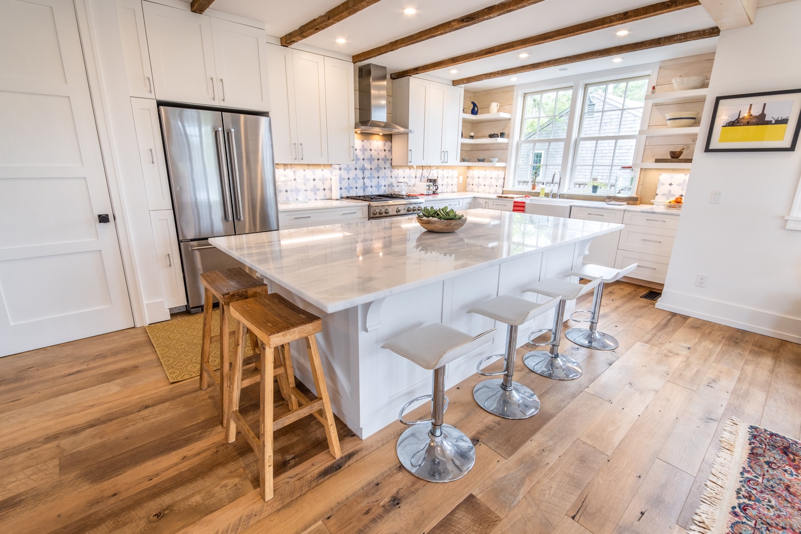 33.5 Vesper Lane Nantucket, MA 02554 - Photo 12 of 55 a dining room with wooden floor and large window