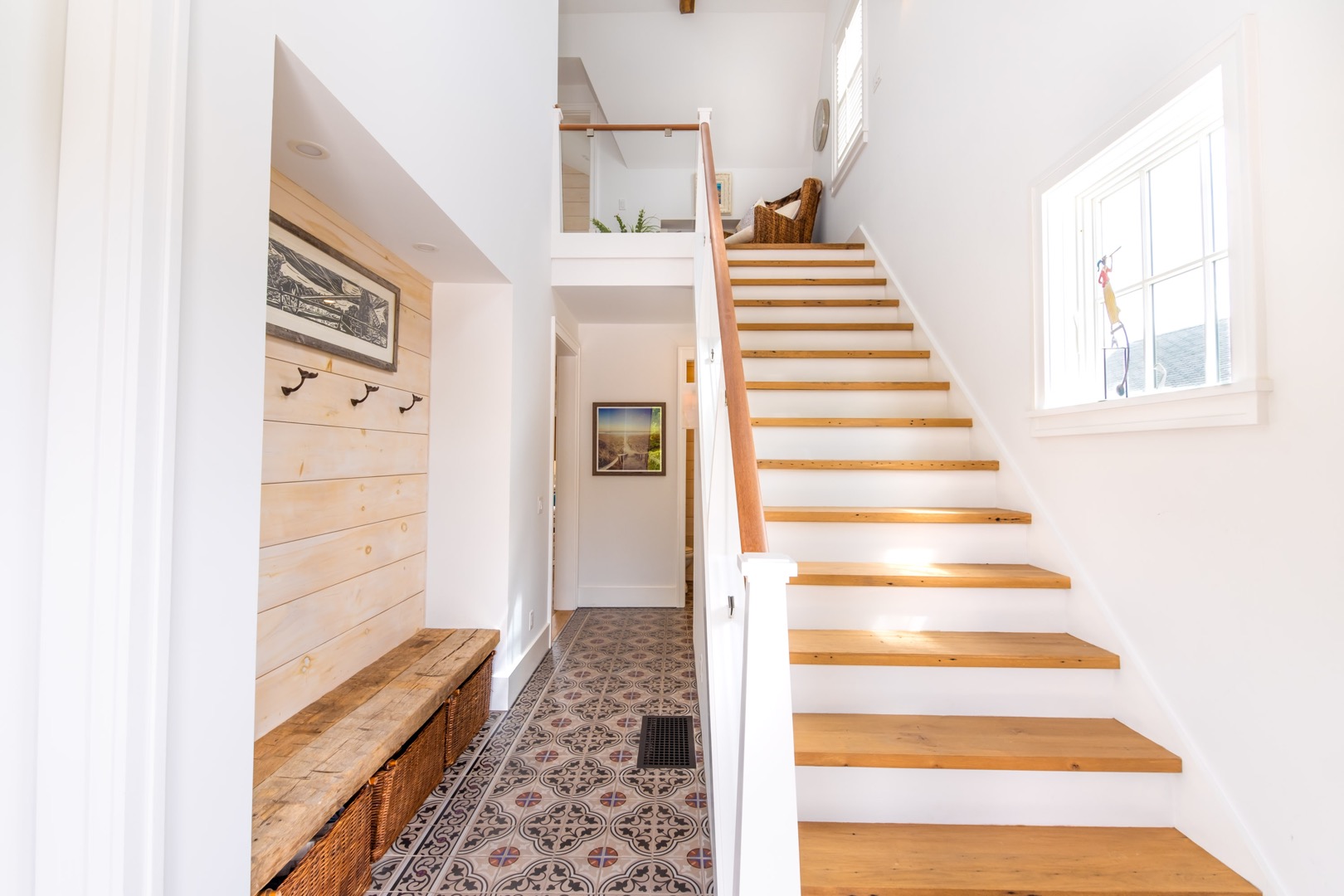 33.5 Vesper Lane Nantucket, MA 02554 - Photo 20 of 55 a view of a hallway with front door wooden floor and stairs