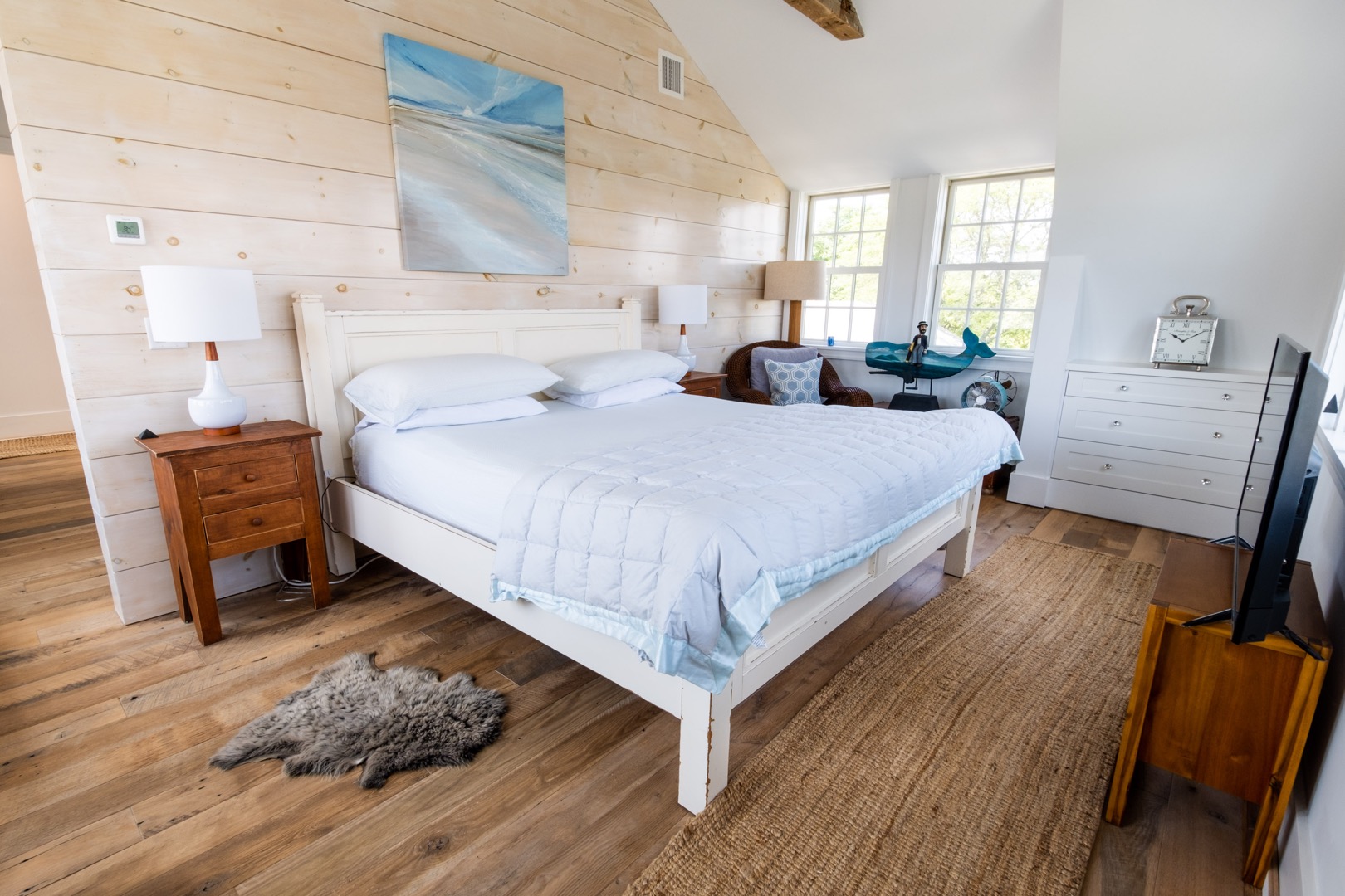 33.5 Vesper Lane Nantucket, MA 02554 - Photo 27 of 55 a bed room with a bed and a chair